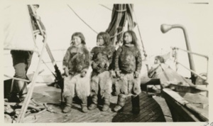 Image of Three Eskimo [Inughuit] boys on the deck of Roosevelt